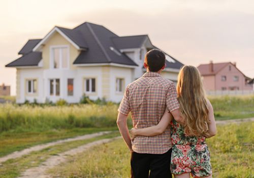 Couple purchasing home